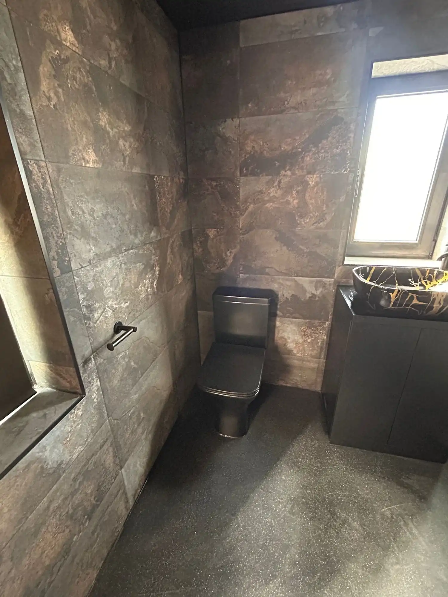 Brown tiled toilet 